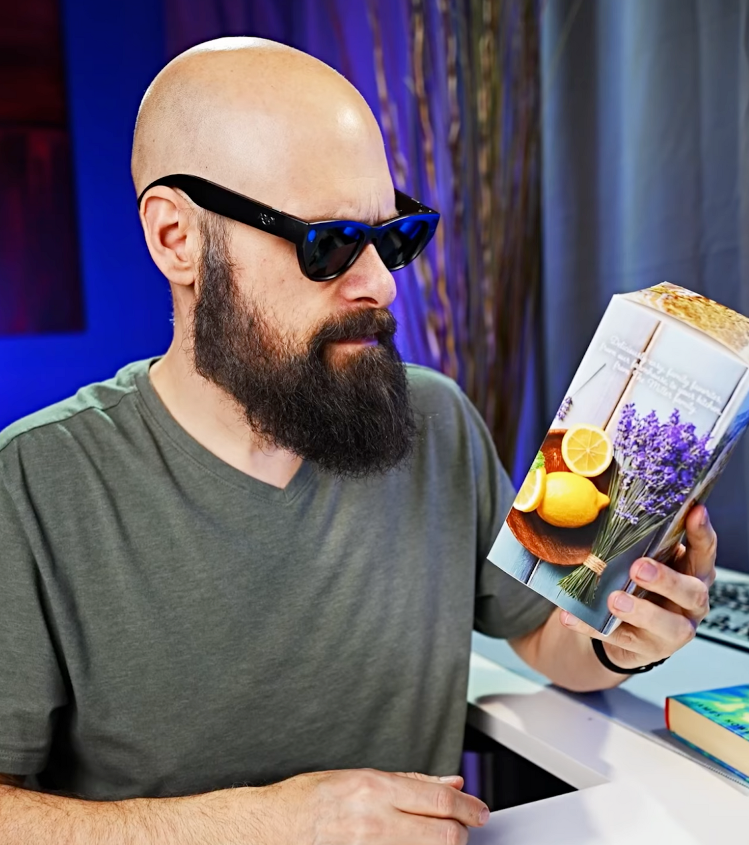 Man wearing echovision glasses holding a box